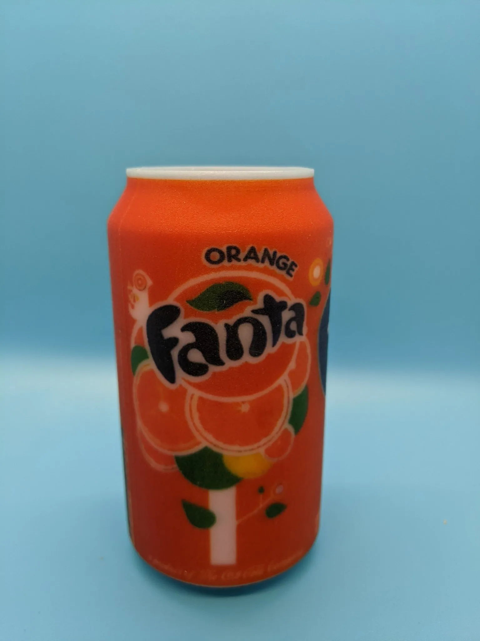 Printed replica of a soda can with full-color label