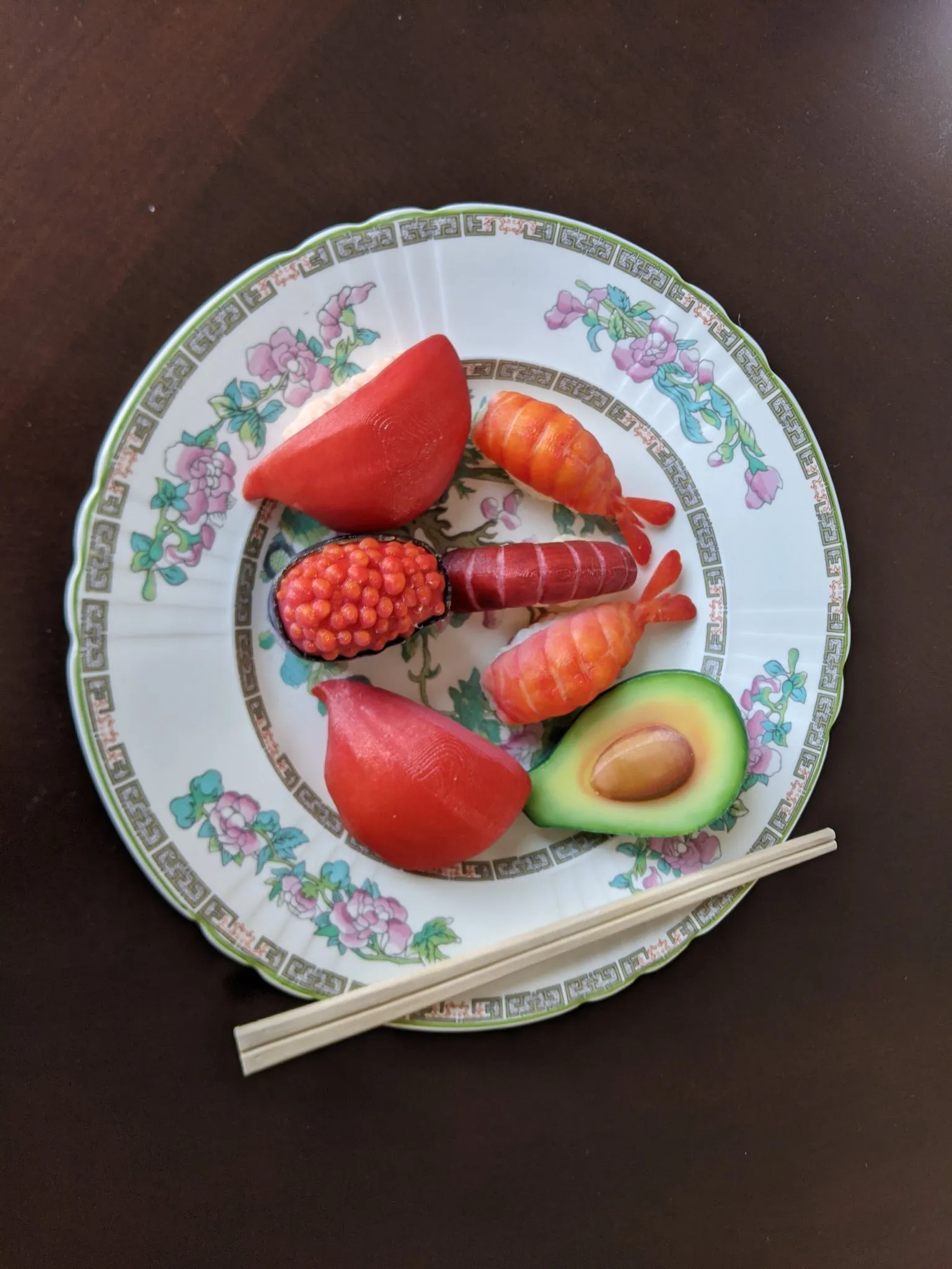 Full-color printed sushi display model on a plate